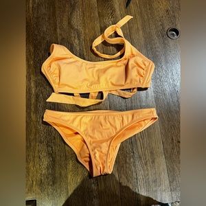 Orange and maroon two piece bathing suit
